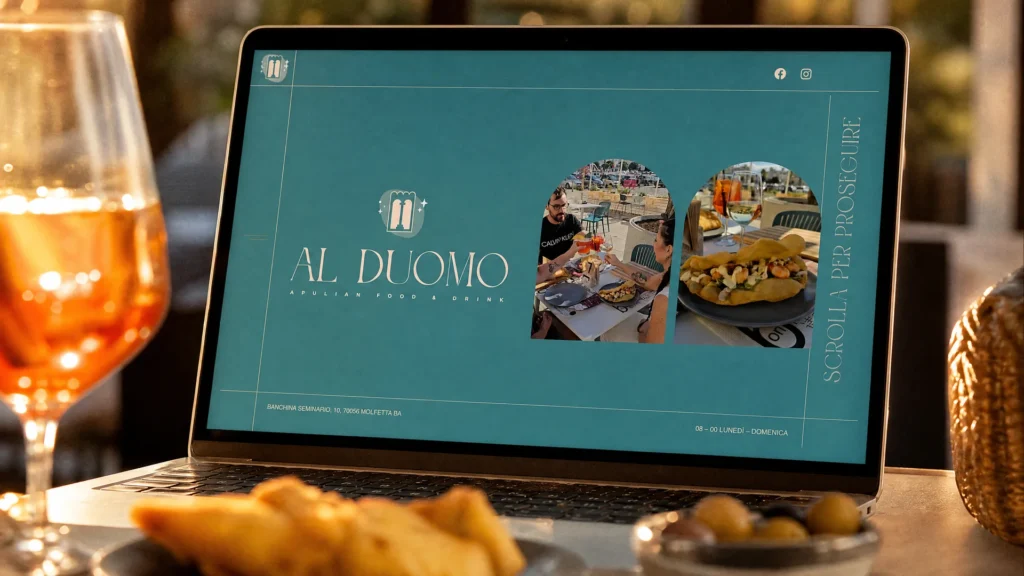 Sito Bar al Duomo su laptop con aperitivo